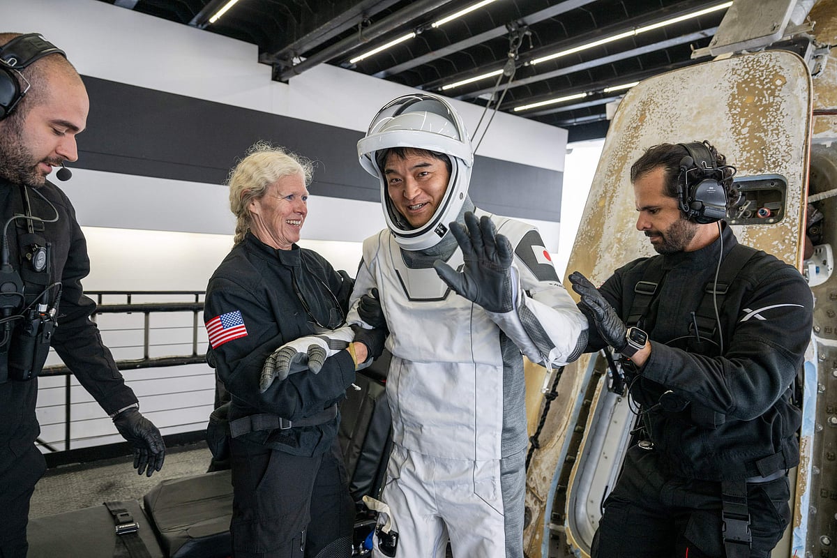 This picture provided by NASA shows Japan Aerospace Exploration Agency (JAXA) astronaut Takuya Onishi NASA astronaut being helped out of the SpaceX Dragon Endurance spacecraft on board the SpaceX recovery ship Shannon after he, NASA astronauts Anne McClain, Nichole Ayers and Roscosmos cosmonaut Kirill Peskov landed in the Pacific Ocean off the coast of San Diego, California, on 9 August, 2025.