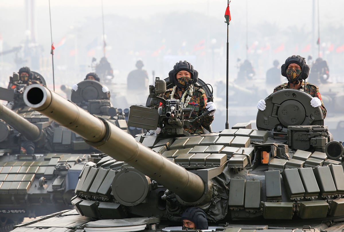 Military personnel in tanks participates in a parade on Armed Forces Day in Naypyitaw, Myanmar, 27 March 2021.