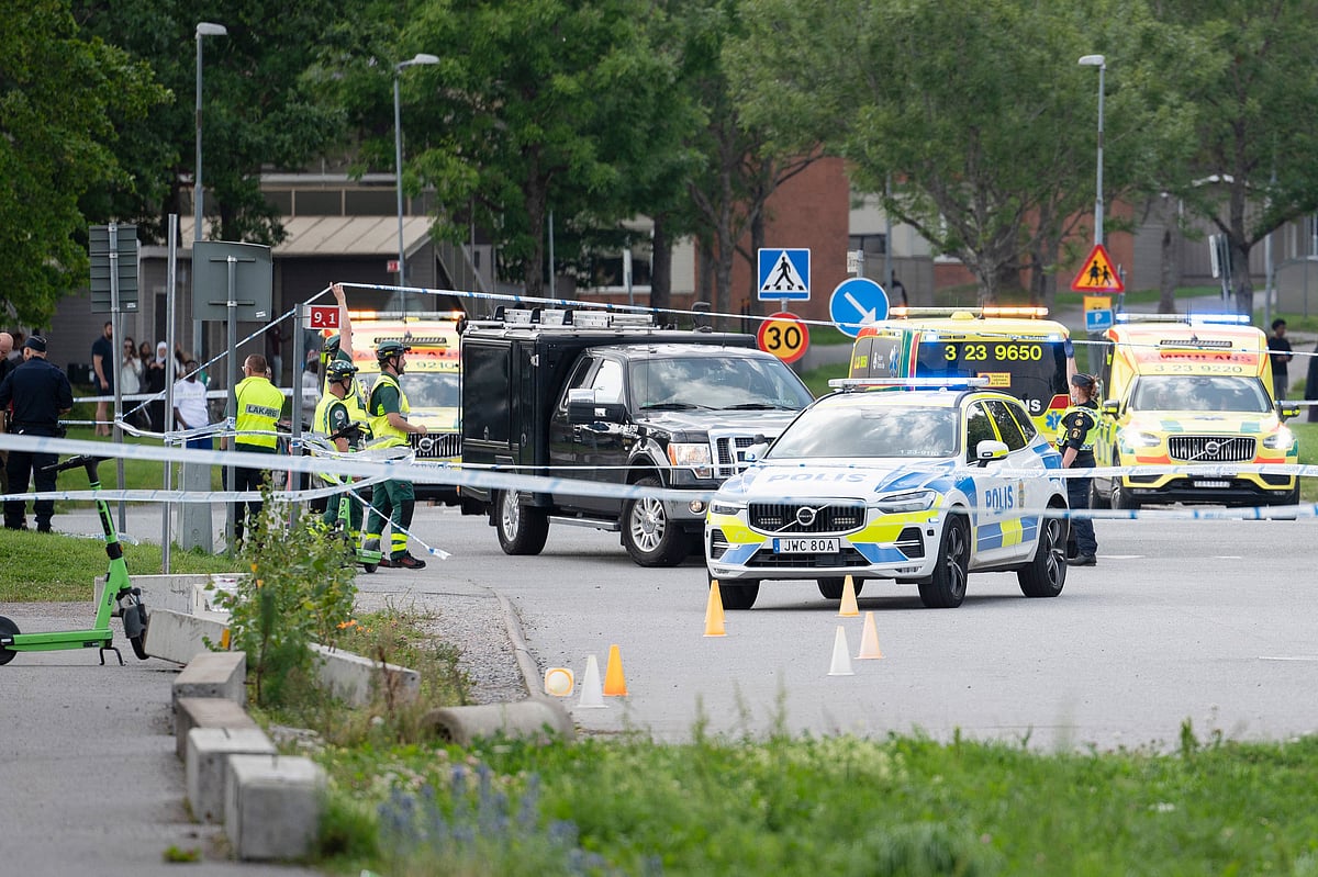 Police work at the scene outside a mosque in Orebro after a shooting where several people injured in Orebro, Sweden on 15 August 2025.