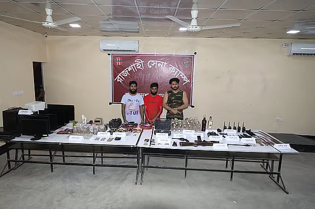 Weapons, ammunition, and bomb-making materials recovered in raid at ‘Doctor English’ coaching centre in Rajshahi’s Kadirganj.