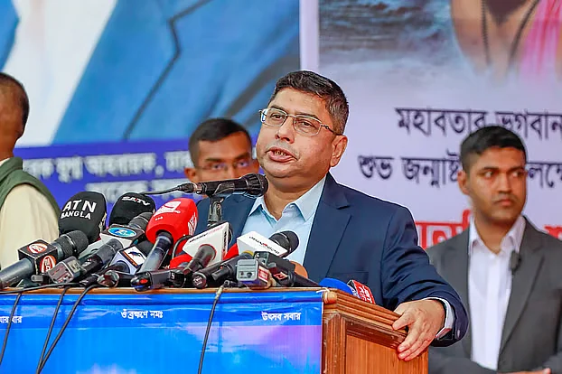 Army Chief General Waker-uz-Zaman delivers a speech at the Janmashtami celebration at Palashi Intersection in Dhaka on 16 August.
