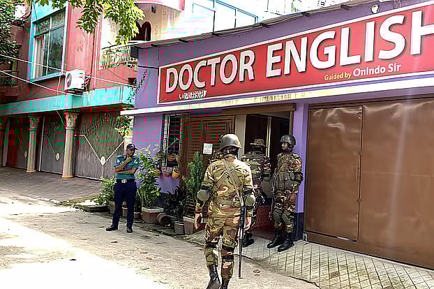 Joint forces launched a raid on a building in the Kadirganj area of Rajshahi city on Saturday morning.