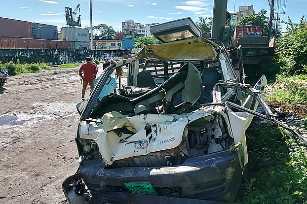 The wrecked pickup van. Photo taken from City Gate area in the city.