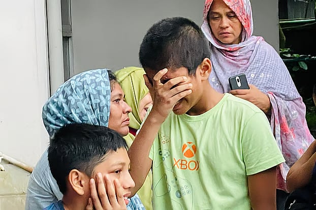 Relatives are crying after losing four family members. On Friday, at the Mainamati Highway Police Station.