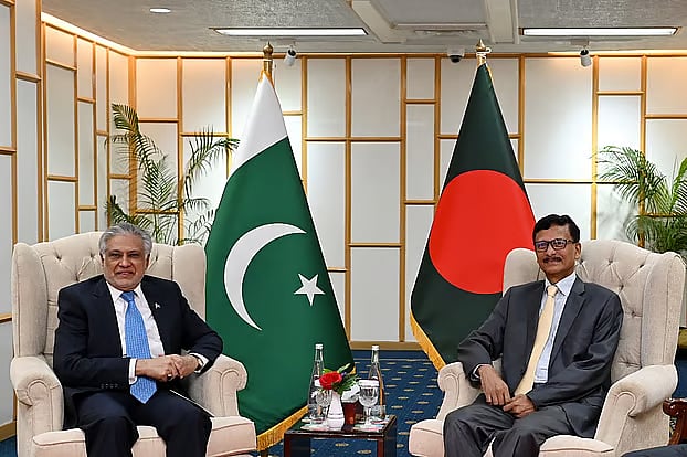 Pakistan’s Deputy Prime Minister and Foreign Minister Ishaq Dar in a meeting with Foreign Affairs Adviser Touhid Hossain (right)