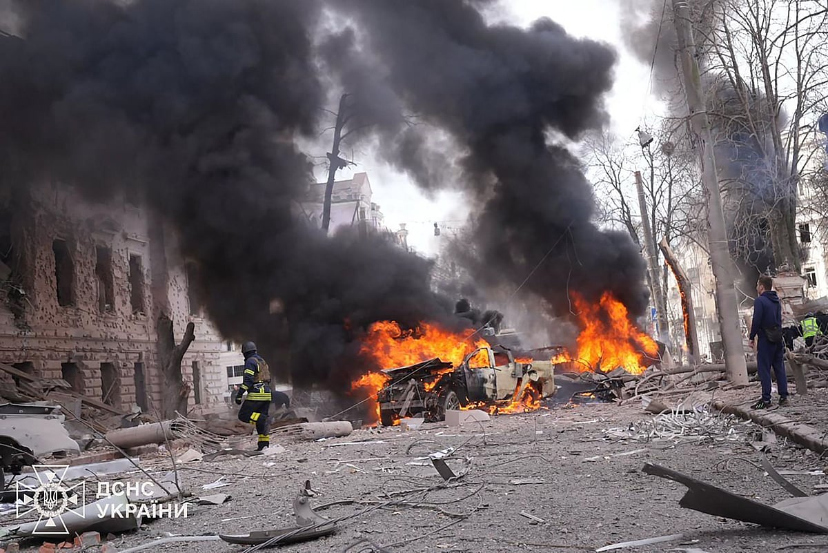 This handout photograph taken and released by the Ukrainian Emergency Service on 13 April, 2025, shows a Ukrainian rescuer working at the site of a missile attack in Sumy, northeastern Ukraine, amid the Russian invasion of Ukraine. The fate of several regions of the country occupied by Russian troops is at the centre of diplomatic manoeuvring to find a solution to Russia's invasion of Ukraine.