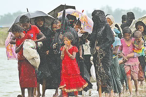 Rohingya refugees fleeing Myanmar's Rakhine state in fear of their lives.