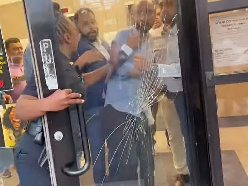 Activists and supporters of Awami League smashed the glass door of the Bangladesh Consulate in New York.