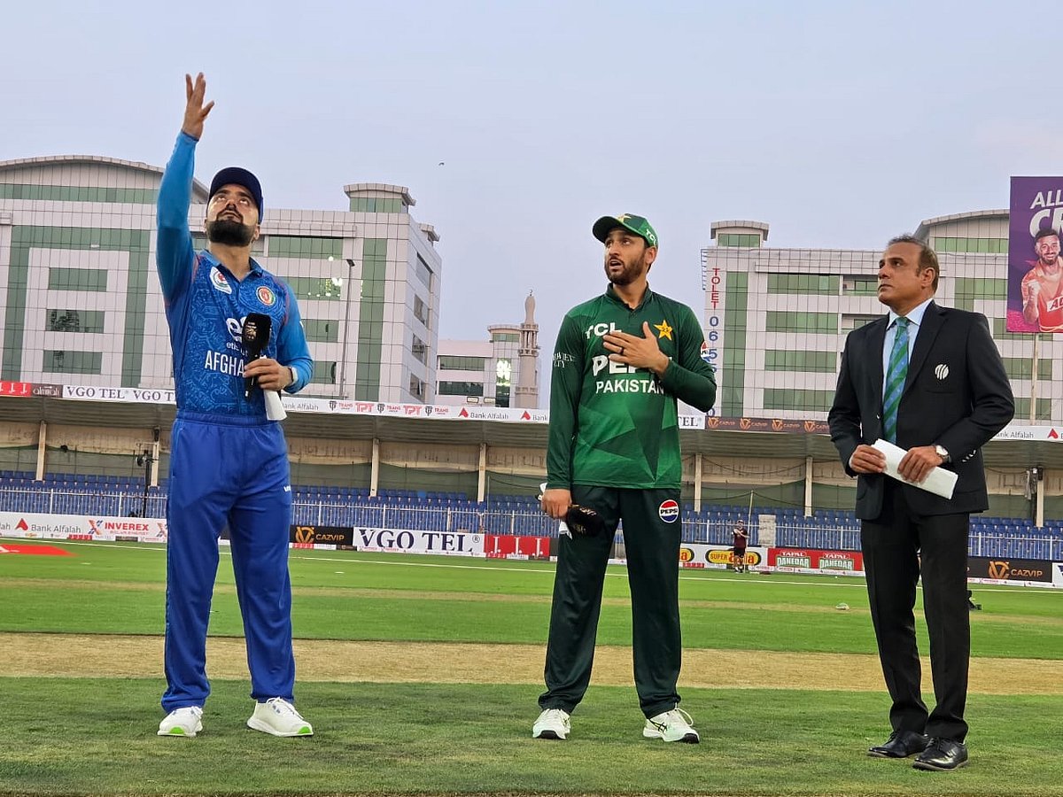 Afghanistan captain Rashid Khan flips toss ahead of their match against Pakistan.