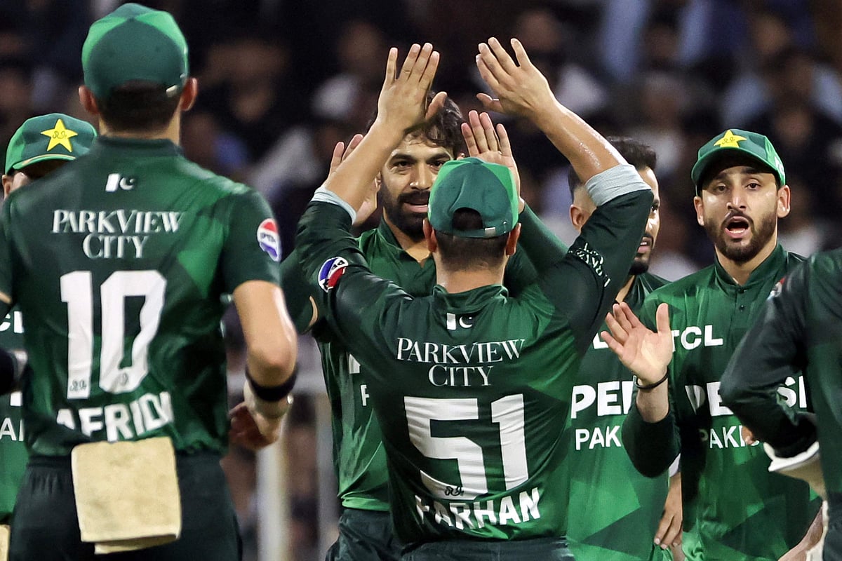 Pakistan's players celebrate after taking the wicket of Afghanistan's Sediqullah Atal during the T20 international cricket match of a tri-series between Afghanistan and Pakistan in Sharjah on August 29, 2025.