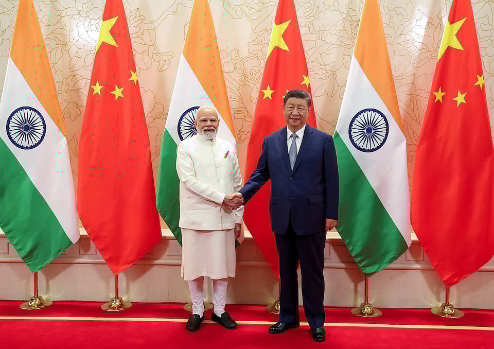 India's Prime Minister Narendra Modi shakes hands with Chinese President Xi Jinping during a meeting on the sidelines of Shanghai Cooperation Organisation (SCO) Summit in Tianjin, China, 31 August, 2025.