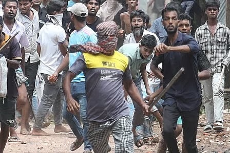 A man covering his face with clothes also took part in the attack on the CU students
