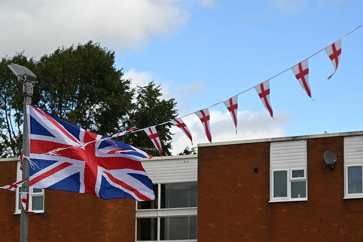 A Union Jack flag and St Georges Cross bunting flutter in the wind, in Worcester, north west England, on September 3, 2025