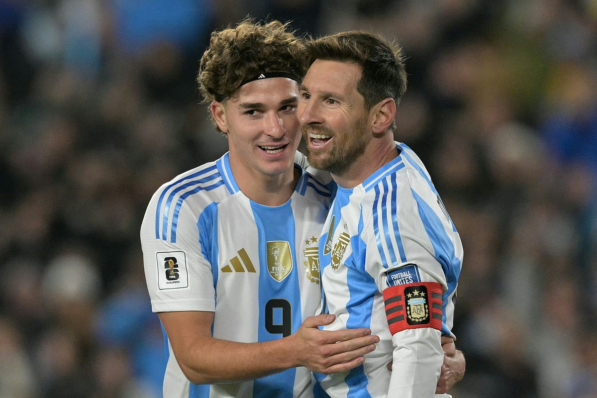 Argentina's forward #10 Lionel Messi celebrates after scoring his second goal with forward #09 Julian Alvarez during the 2026 FIFA World Cup South American qualifiers football match between Argentina and Venezuela at the Mas Monumental stadium in Buenos Aires on 4 September, 2025