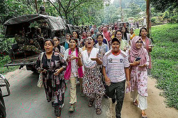 Students protest against the clash at Chittagong University.