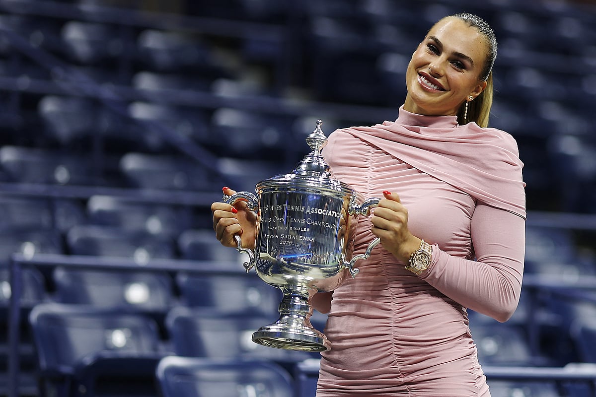 Aryna Sabalenka poses with the championship trophy after defeating Amanda Anisimova of the United States during their Women's Singles Final match on Day Fourteen of the 2025 US Open at USTA Billie Jean King National Tennis Center on 6 September, 2025 in the Queens borough of New York City.