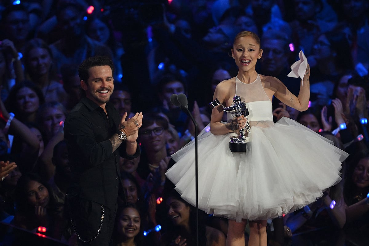 US singer-songwriter Ariana Grande (R) and US music video director Christian Breslauer accept the award for Video of the Year for 'Brighter Days Ahead' on stage during the MTV Video Music Awards at UBS Arena in Elmont, New York, on 7 September, 2025.