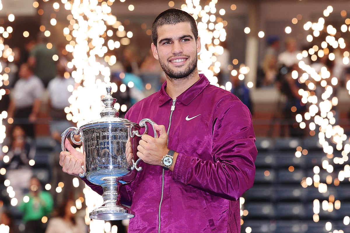 Carlos Alcaraz of Spain poses with his trophy after defeating Jannik Sinner of Italy during their Men's Singles Final match on Day Fifteen of the 2025 US Open at USTA Billie Jean King National Tennis Center on 7 September, 2025 in New York City.