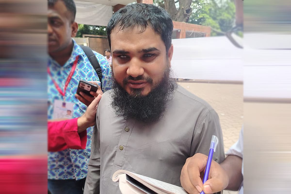 Faruk Hawlader expresses joy after casting his vote through Braille system on 9 September