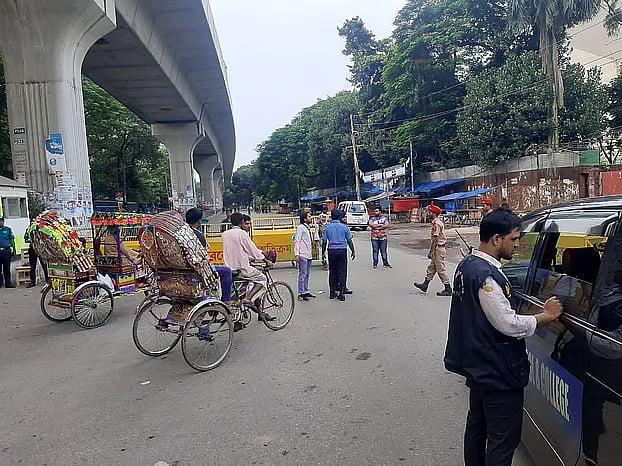 Tight security at Dhaka University gates. Tuesday morning.