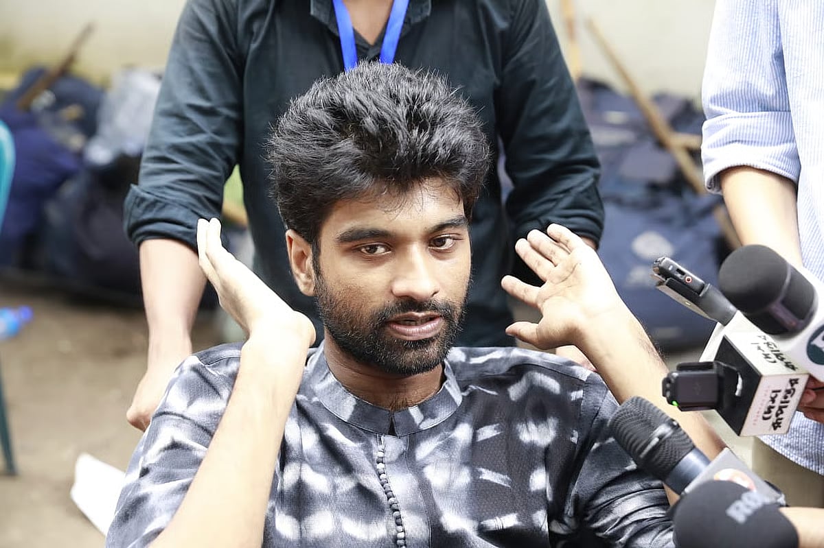 Meghmollar Basu, GS candidate from the Protirodh Porshod panel in the DUCSU election, talks to the media after casting his vote