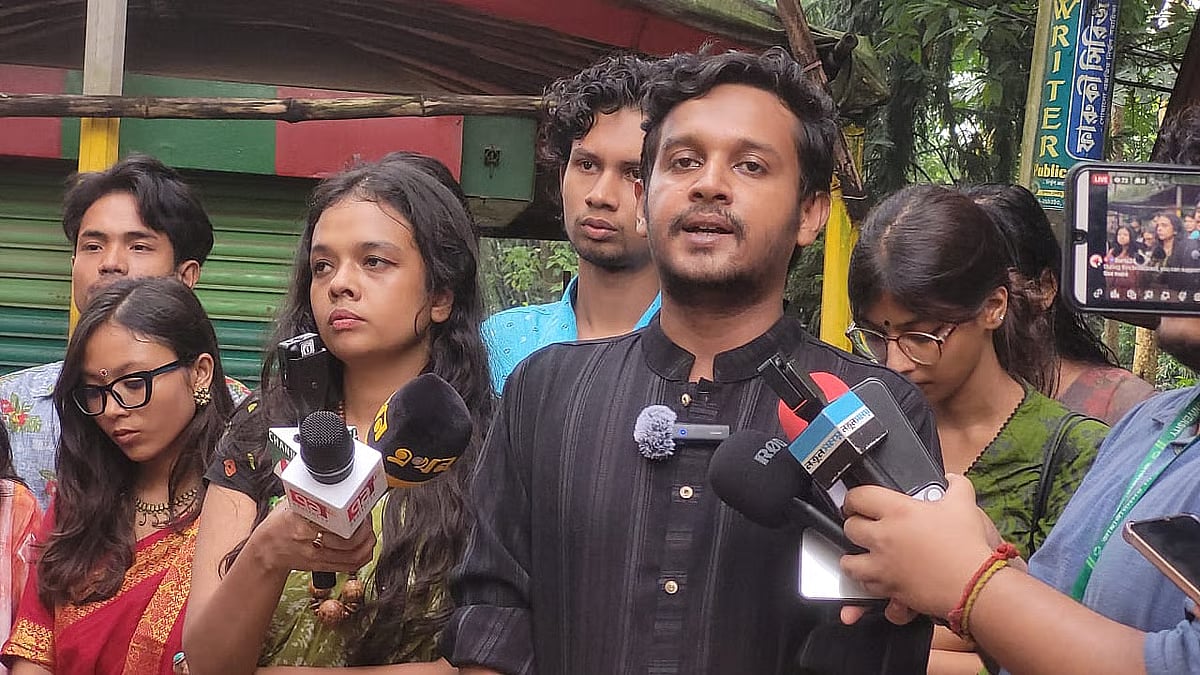Candidates from the leftist student-backed panel Sampriti Oikko Forum speak to reporters as voting for the JUCSU elections continues.