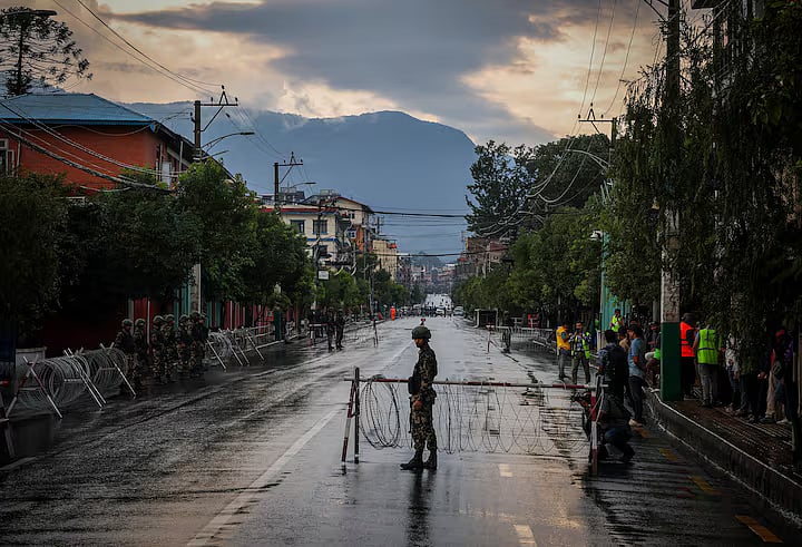 A Nepali Army soldier guards outside presidential building "Shital Niwas", following Monday's deadly anti-corruption protests triggered by a social media ban, which was later lifted, in Kathmandu, Nepal, 12 September, 2025.