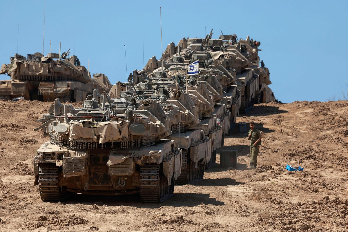 A convoy of Israeli tanks is deployed at Israel’s border with the Gaza Strip on 16 September 2025. Israel launched its ground assault on Gaza City before dawn on 16 September, shortly after US Secretary of State Marco Rubio’s visit expressing robust support for the offensive, while a United Nations probe charged Israel with committing “genocide” in the Palestinian territory and accused its Prime Minister and other top officials of incitement