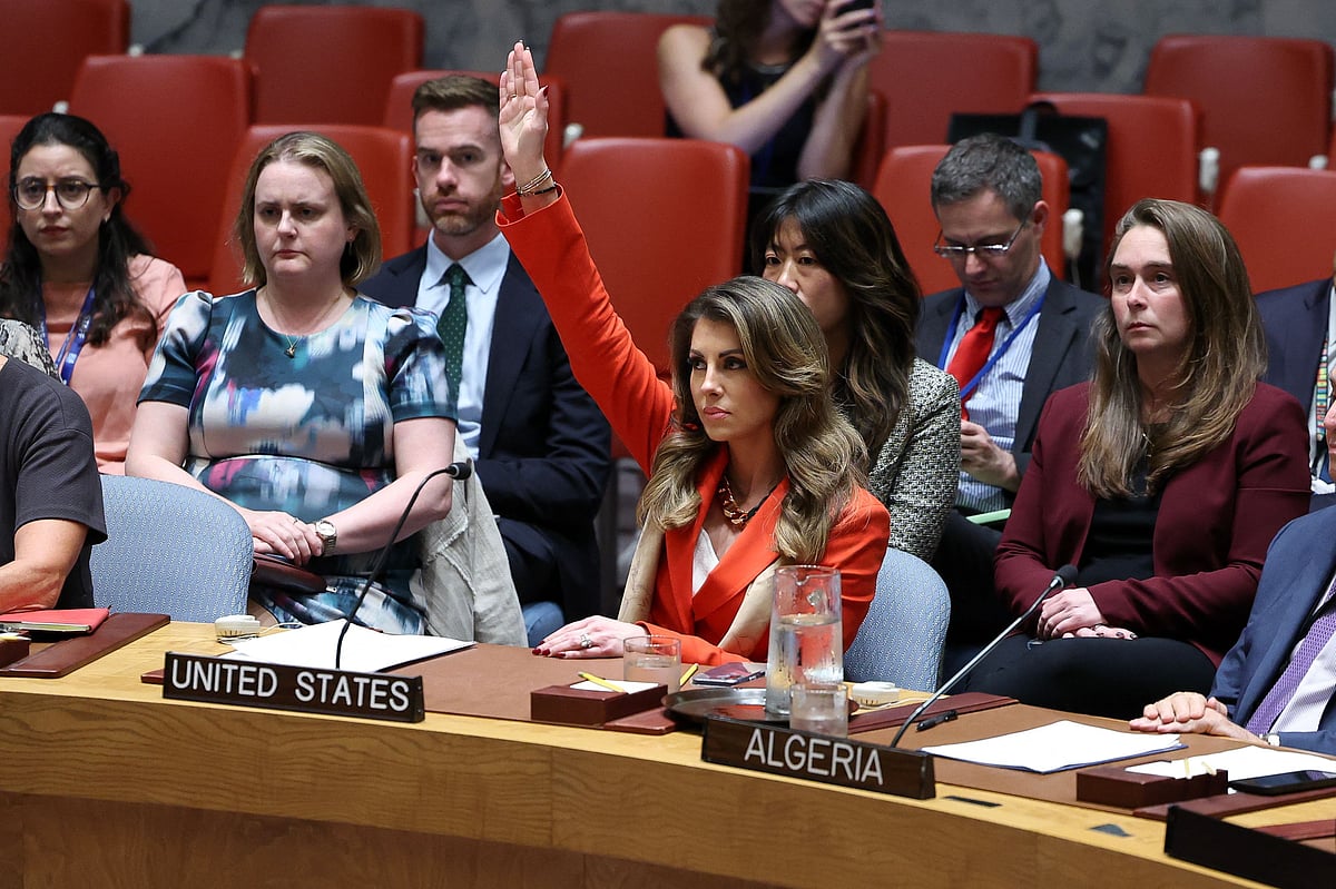 US deputy Middle East envoy Morgan Ortagus (C) raises her hand to veto a draft resolution during a United Nations Security Council meeting on the situation in Gaza, at UN headquarters in New York on 18 September 2025.