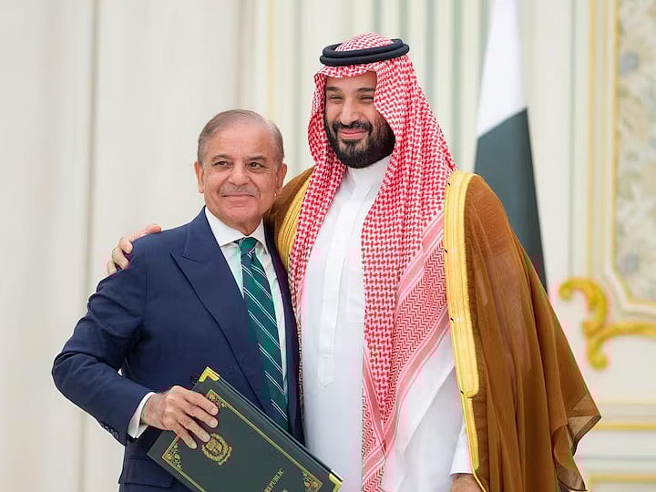 Saudi Crown Prince Mohammed bin Salman and Pakistan Prime Minister Shehbaz Sharif embrace each other on the day they sign a defence agreement, in Riyadh, Saudi Arabia, 17 September, 2025.