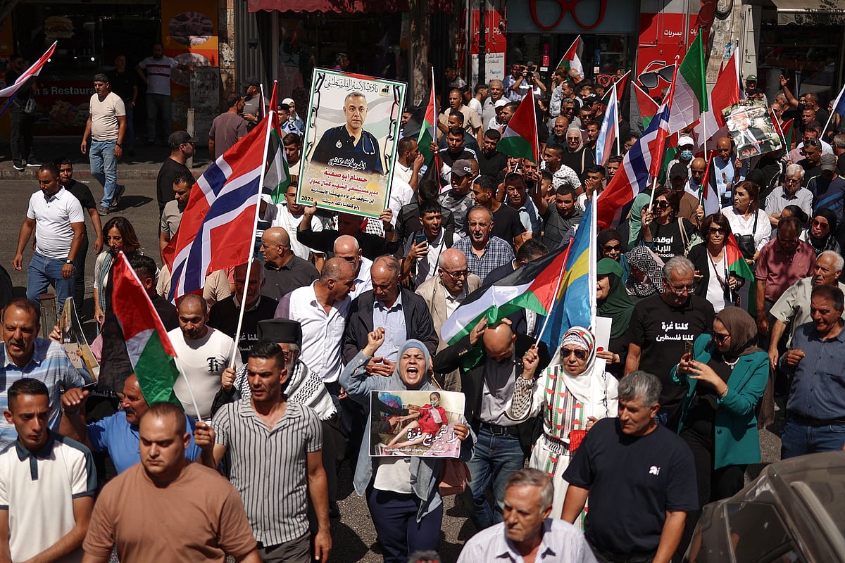 Palestinians chant slogans during a gathering in Ramallah in the Israeli occupied West Bank on 23 September, 2025, to express their support to president Mahmud Abbas and to express their support for countries formally recognising the state of Palestine