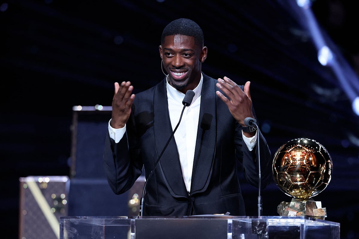 Paris Saint-Germain's French forward Ousmane Dembele speaks after receiving the Ballon d'Or award during the 2025 Ballon d'Or France Football award ceremony at the Theatre du Chatelet in Paris on 22 September, 2025