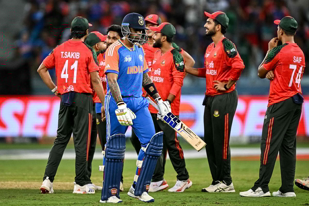 India's captain Suryakumar Yadav (front) walks back to the pavilion after his dismissal during the Asia Cup 2025 Super Four Twenty20 international cricket match between Bangladesh and India at the Dubai International Stadium in Dubai on September 24, 2025