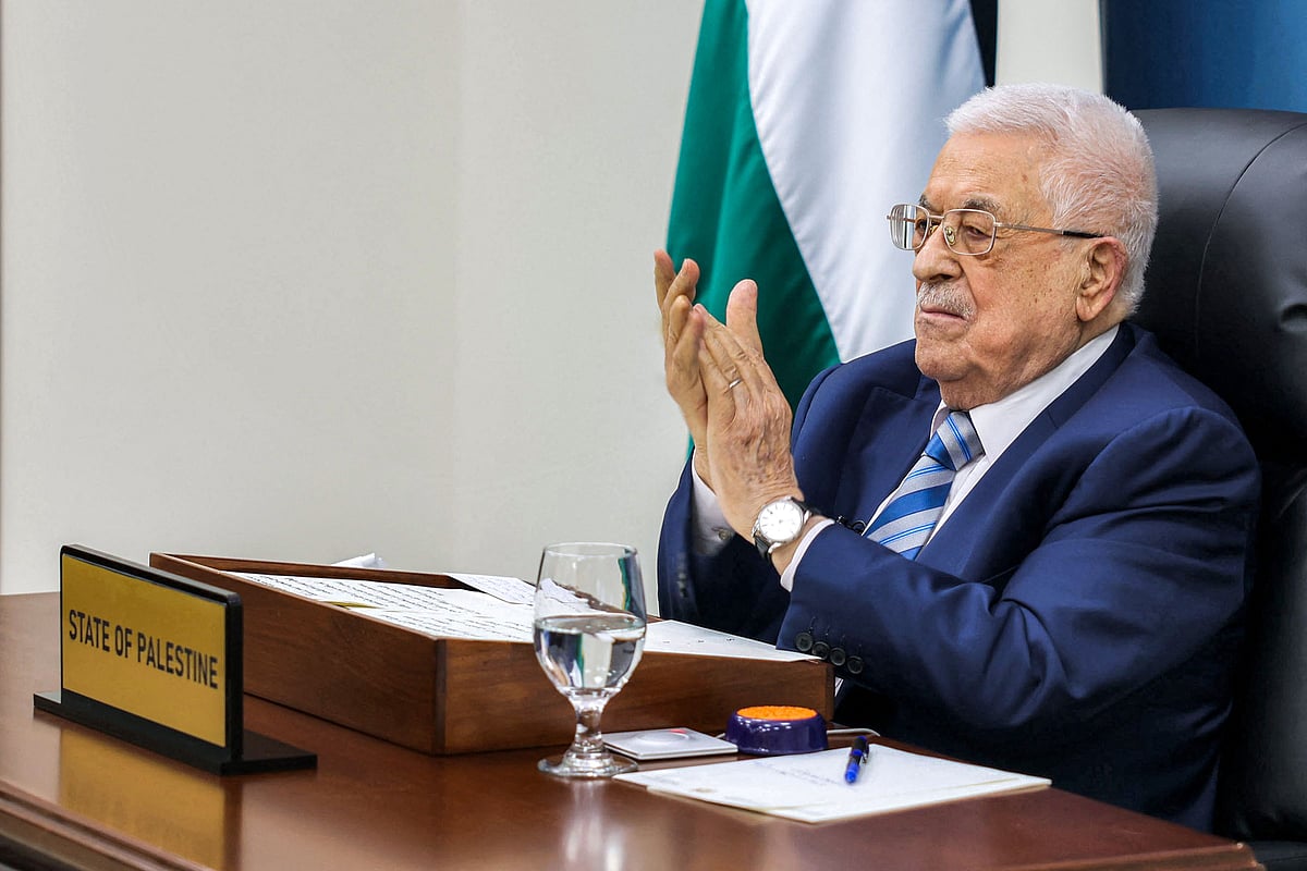 This handout picture provided by the Palestinian Authority's press office (PPO) shows Palestinian president Mahmud Abbas applauding as he gives by video link an address to the UN summit on a two-state solution in New York City, from his headquarters in Ramallah in the occupied West Bank on 22 September, 2025