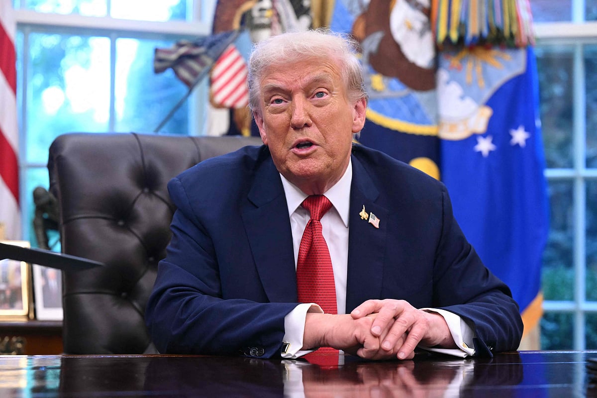 US President Donald Trump speaks to the press after signing an executive order on Tiktok in the Oval Office of the White House in Washington, DC on September 25, 2025