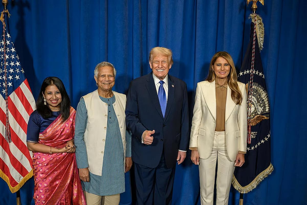 US President Donald Trump and First Lady Melania Trump pose for a picture with Bangladesh Chief Adviser Professor Muhammad Yunus and his daughter Deena Yunus during a reception hosted by the US President on September 23 in New York.