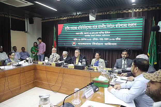 The Chief Election Commissioner, along with other election commissioners and guests, during a dialogue at the conference room of the Election Commission Secretariat In Agargaon on 28 September, 2025
