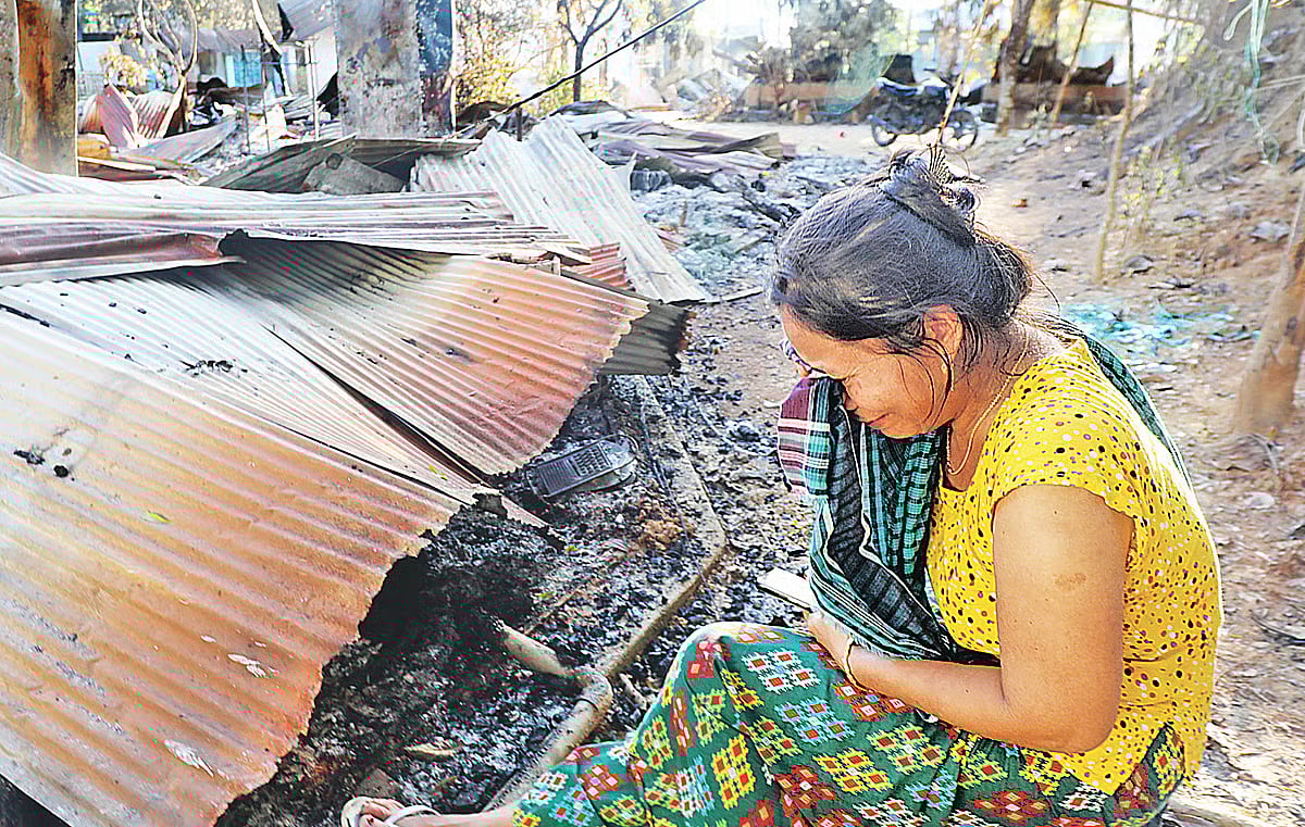 Mibu Marma's house and shop were burnt down in the fire of violence. She left her house and neighborhood with only a piece of cloth to save her life.