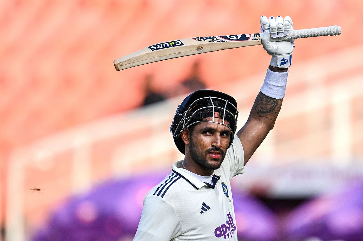 India's Dhruv Jurel gestures as he walks back to the pavilion after his dismissal during the second day of the first Test cricket match between India and the West Indies at the Narendra Modi Stadium in Ahmedabad on October 3, 2025