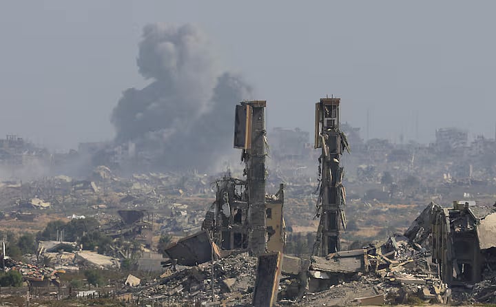 Smoke rises following explosions in Gaza City after Hamas agreed to release hostages and accept some other terms in a U.S. plan to end the war, as seen from central Gaza Strip 4 October, 2025.