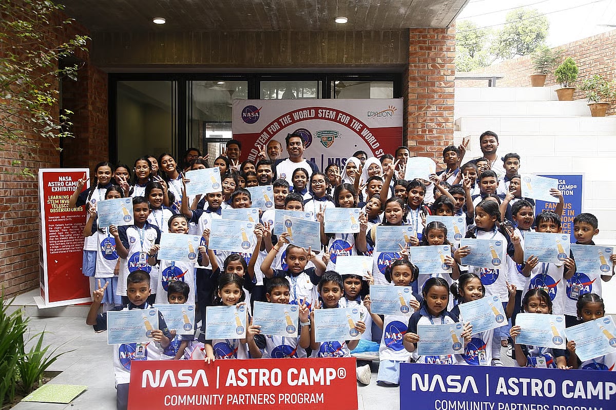 Students of Reaz Public School holding certificates after completing the NASA Astro Camp.