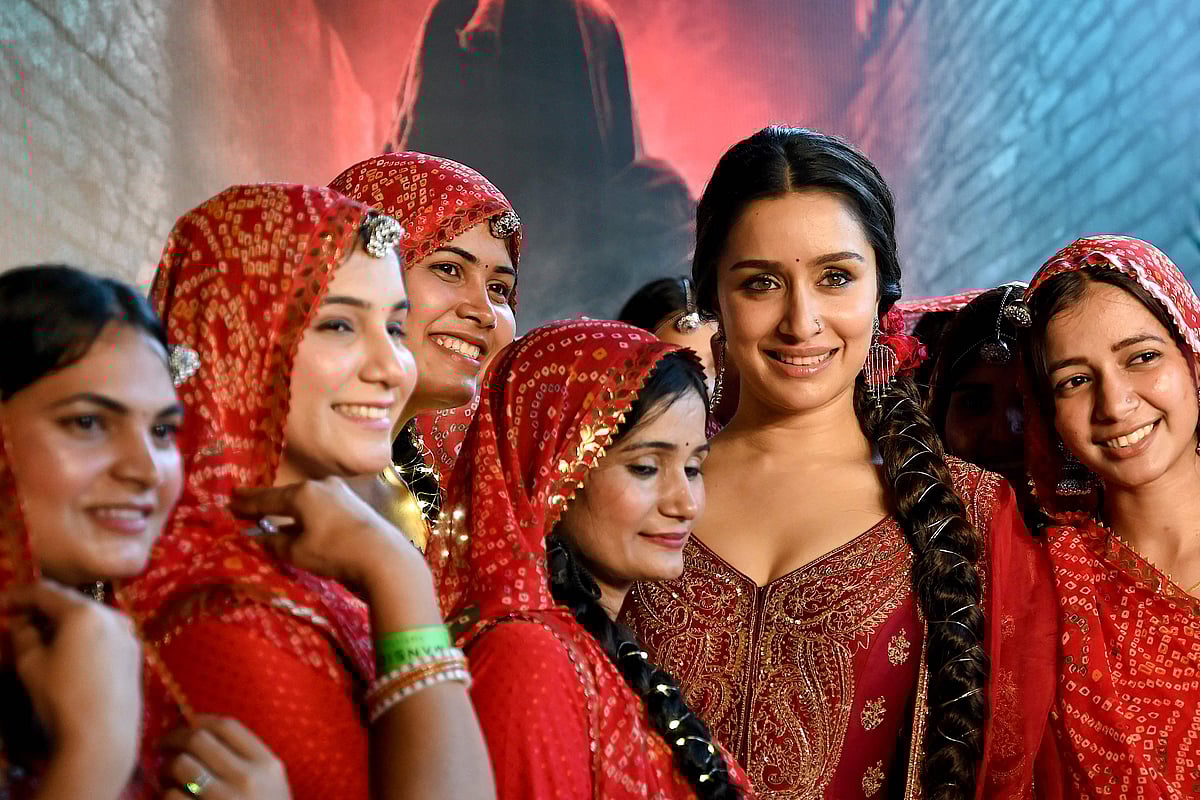 Bollywood actress Shraddha Kapoor (2R) attends the launch of the first song of her upcoming Indian Hindi-language comedy horror film 'Stree 2' in Mumbai on 24 July, 2024.