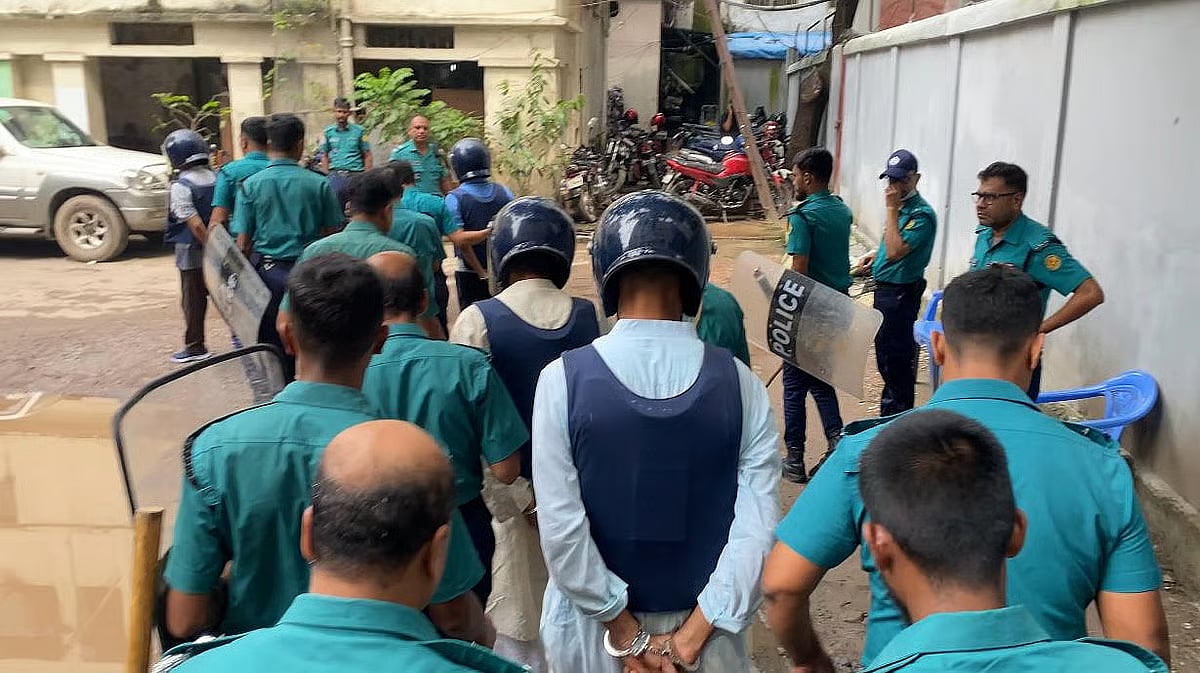 The accused were later taken from the court building to the prison cell.