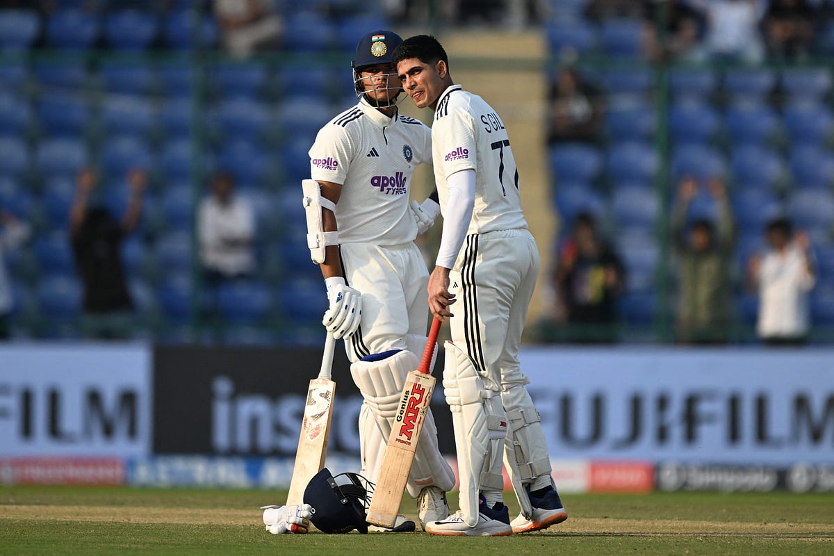 India’s Yashasvi Jaiswal (L) and captain Shubman Gill look on as they speak during the first day of the second and last Test cricket match between India and West Indies at the Arun Jaitley Stadium in New Delhi on 10 October 2025