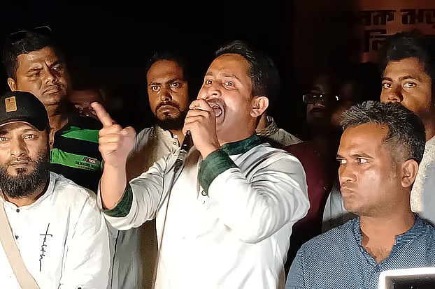 NCP leader Sarjis Alam speaks at the end of the long march from Panchagarh to Banglabandha. Around 9:30pm at the July memorial near the Sher-e-Bangla Park in Panchagarh district town