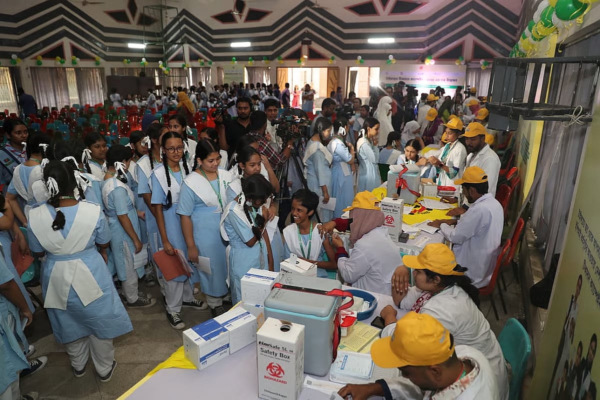 Students receiving typhoid vaccines at Viqarunnisa Noon School and College on Bailey Road in Dhaka on 12 October 2025.