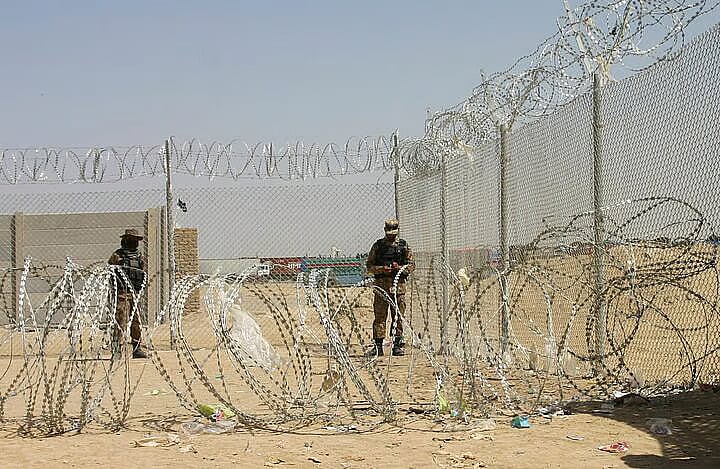 Army soldiers stand guard during a temporary closure of the Friendship Gate crossing point at the Pakistan-Afghanistan border town of Chaman, Pakistan 2 September, 2021.