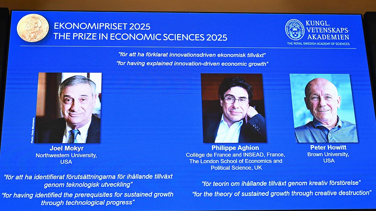 A screen shows (L-R) American-Israeli Joel Mokyr, French economist Philippe Aghion and Canadian Peter Howitt during the announcement of the winner of the 2025 Nobel Prize in Economics, the Sveriges Riksbank Prize in Economic Sciences in Memory of Alfred Nobel, at the Royal Swedish Academy of Sciences in Stockholm, Sweden, on 13 October, 2025.