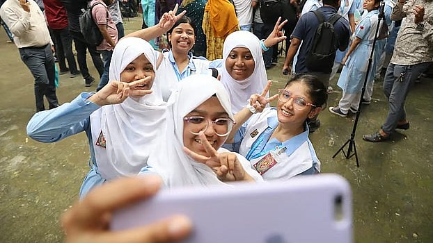 A group selfie after getting the HSC results. The photo was taken at the Viqarunnisa Noon School on 16 October 2025