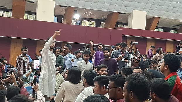 Celebrations after the unofficial announcement of results at the Kazi Nazrul Islam Auditorium on Friday morning.